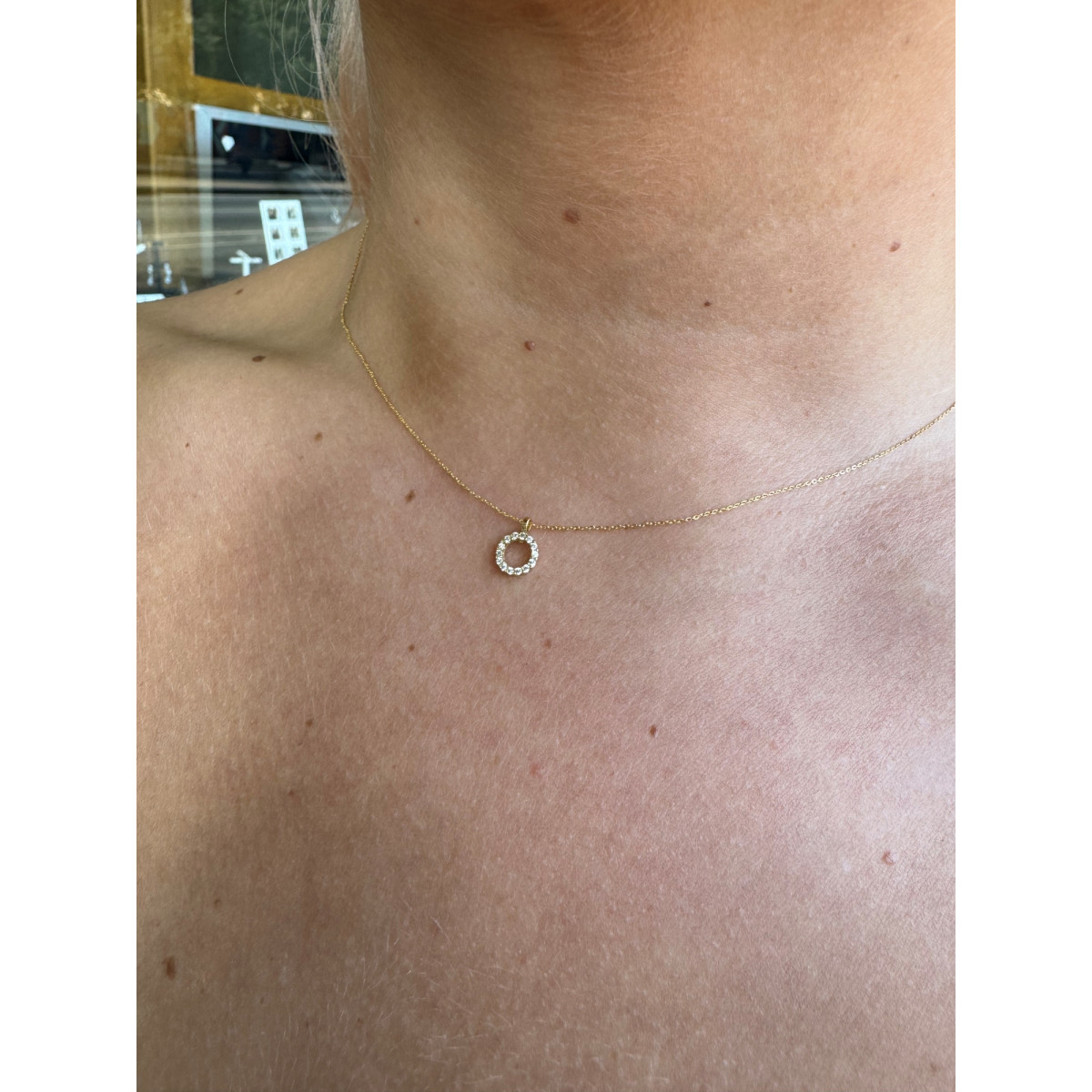 Colla Círculo y circonitas oro 18kt
