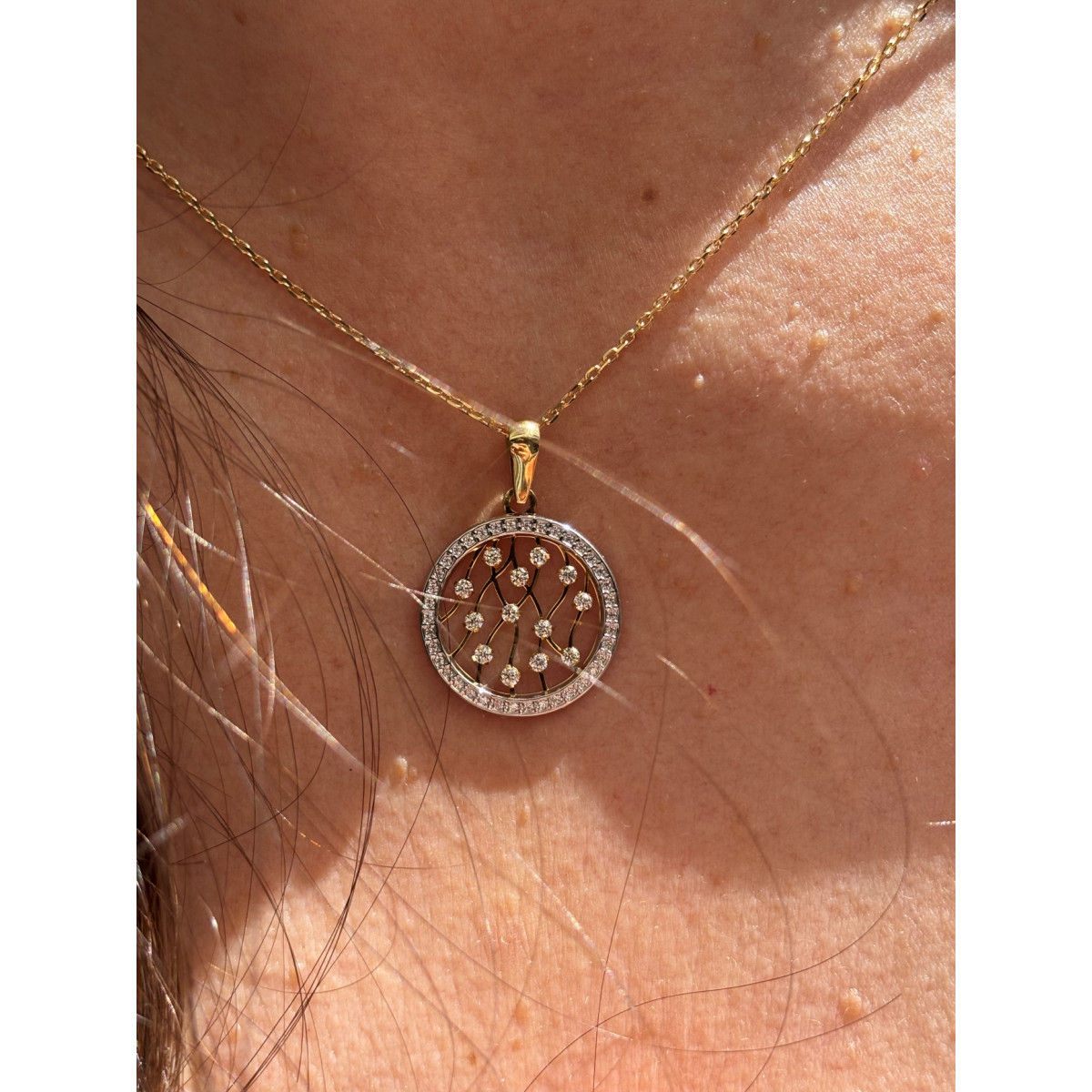 Collar Circular Bicolor en oro amarillo de 18kt y circonitas